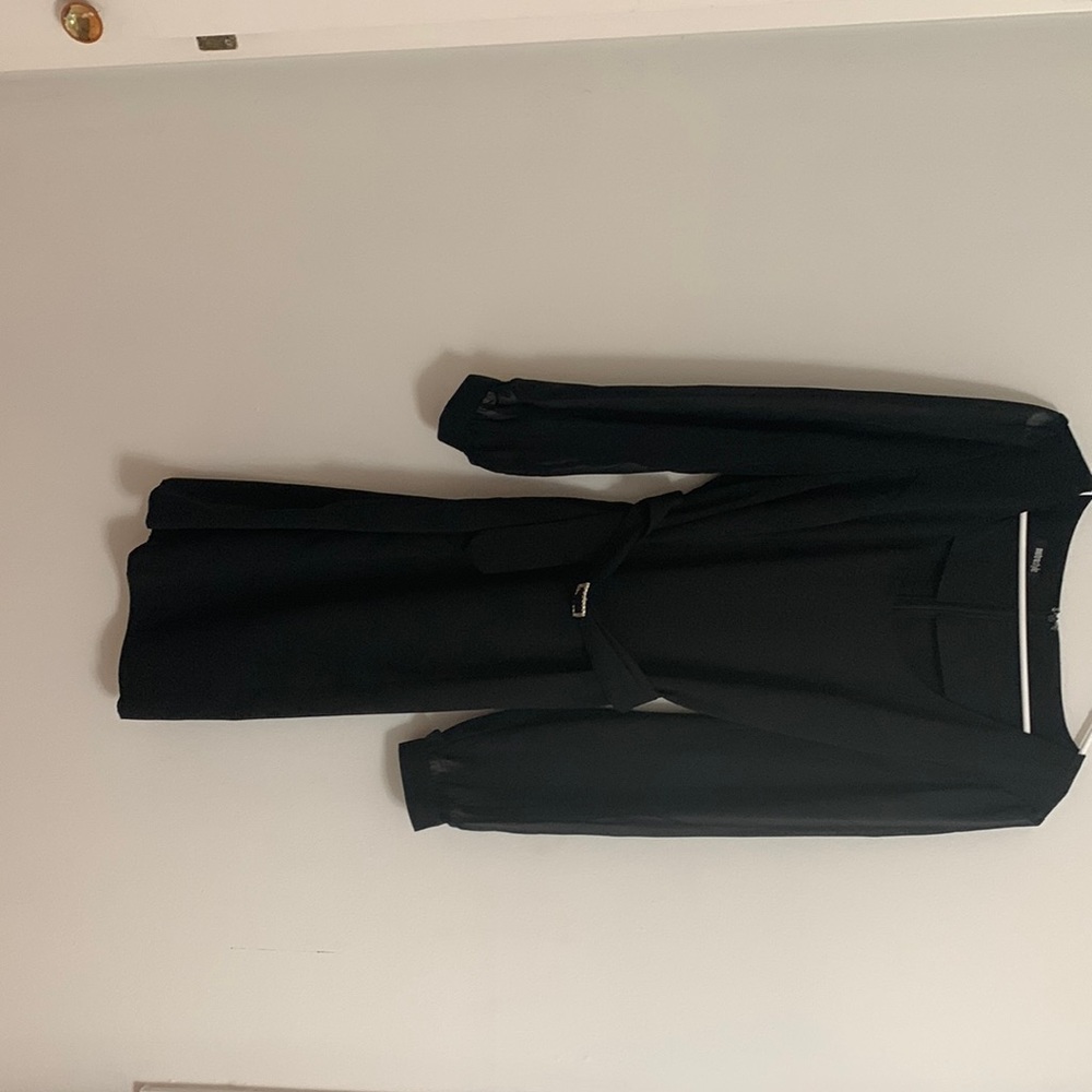 Knee length black dress. Tried on. Never wore